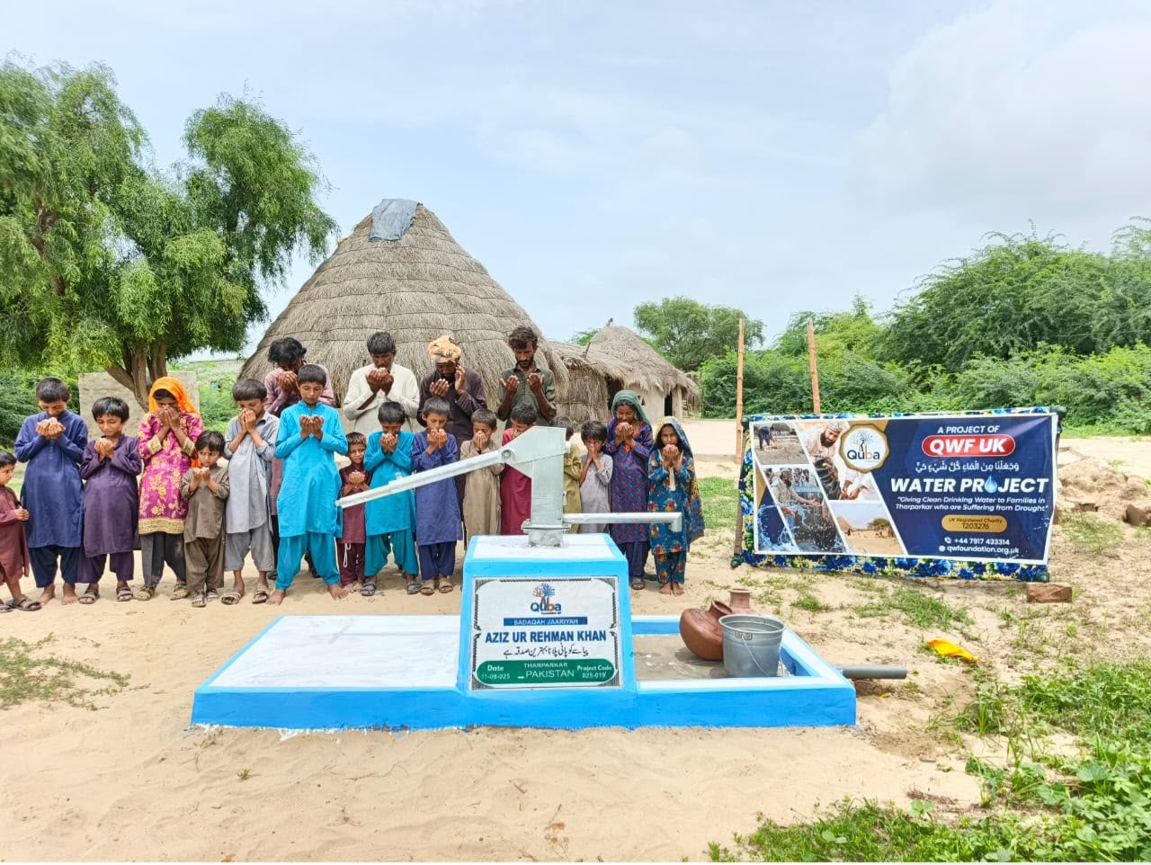 A newly installed hand pump, providing clean water to five families.